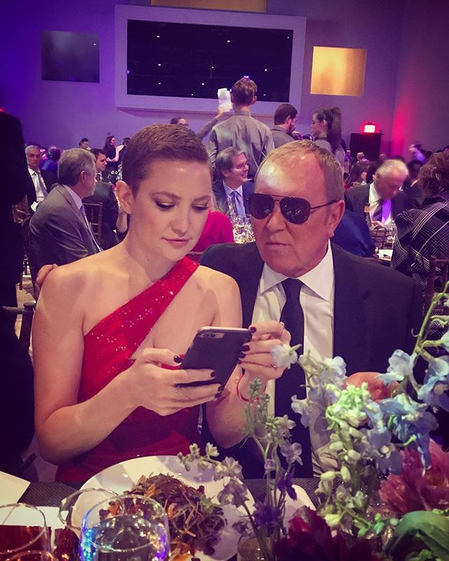 Moments after taking a selfie, @katehudson and @michaelkors realized they had the same hairstyles that evening.         #godslovewedeliver