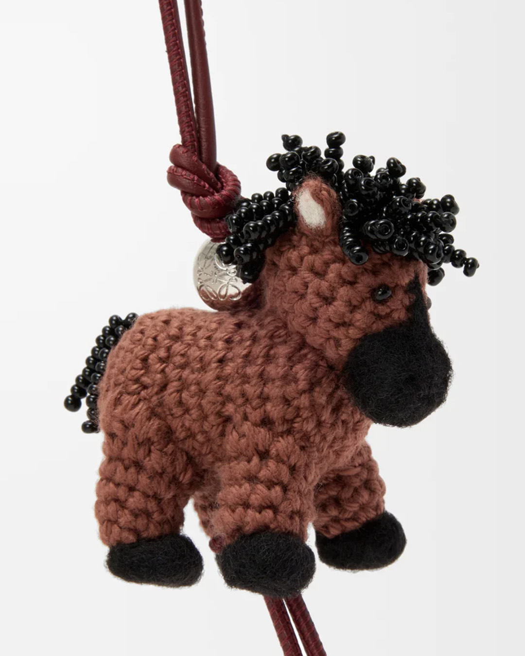 Дэлхийн брэндүүд Цагаан сарын баярт зориулан морь жилийг бэлгэдсэн загваруудаа танилцууллаа (фото 1)